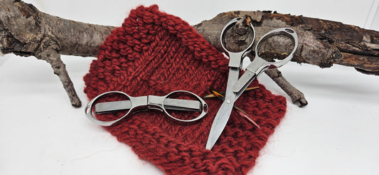 faltbare Schere silberfarbend